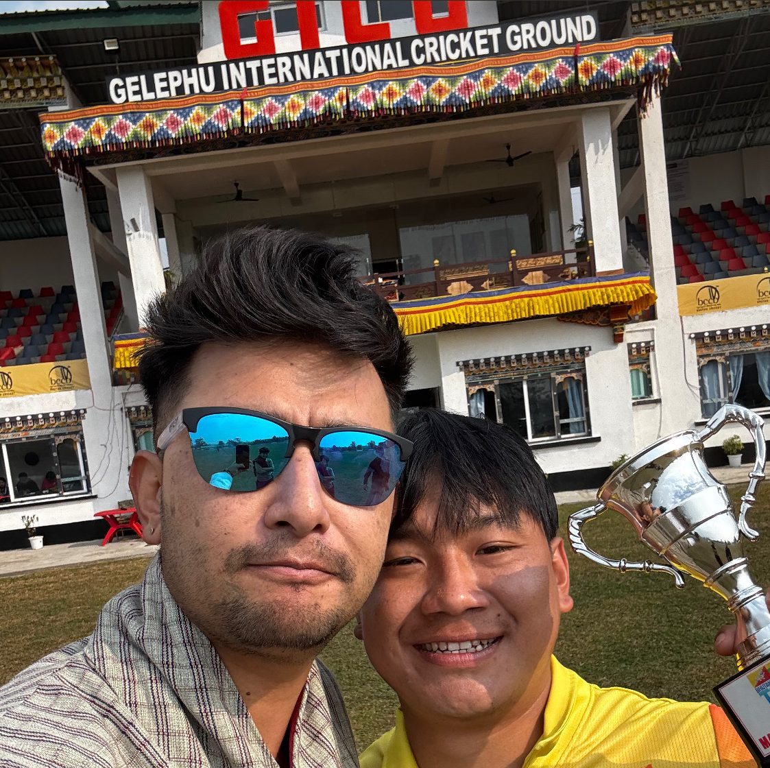 With Namgay after Bhutan's first international hundred in any format